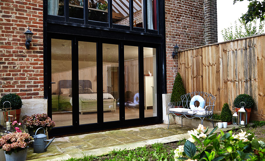 Pouvez-vous utiliser des portes pliantes dans votre conversion de garage