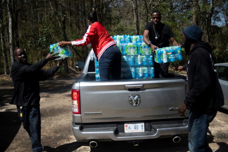 Distribution d'eau à Jackson, dans le Mississippi, le 24 mars 2022 (AFP - Mark Felix)