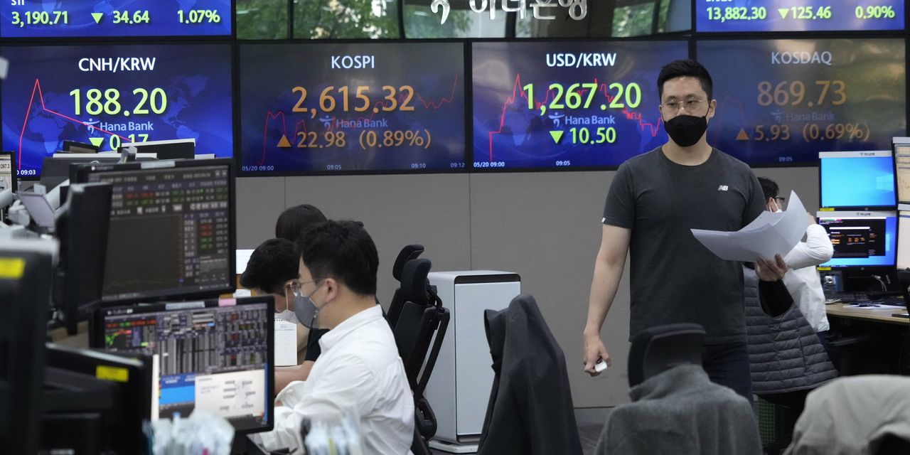 Les actions asiatiques augmentent après que la Chine a abaissé son taux directeur, Wall Street se rapproche du marché baissier - 1