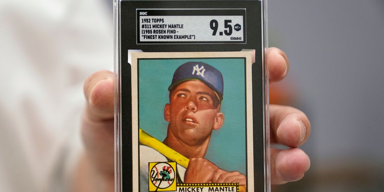 La carte de baseball Mickey Mantle établit un record avec une vente de 12,6 millions de dollars 2 La carte de baseball Mickey Mantle établit un record avec une vente de 12,6 millions de dollars - 1