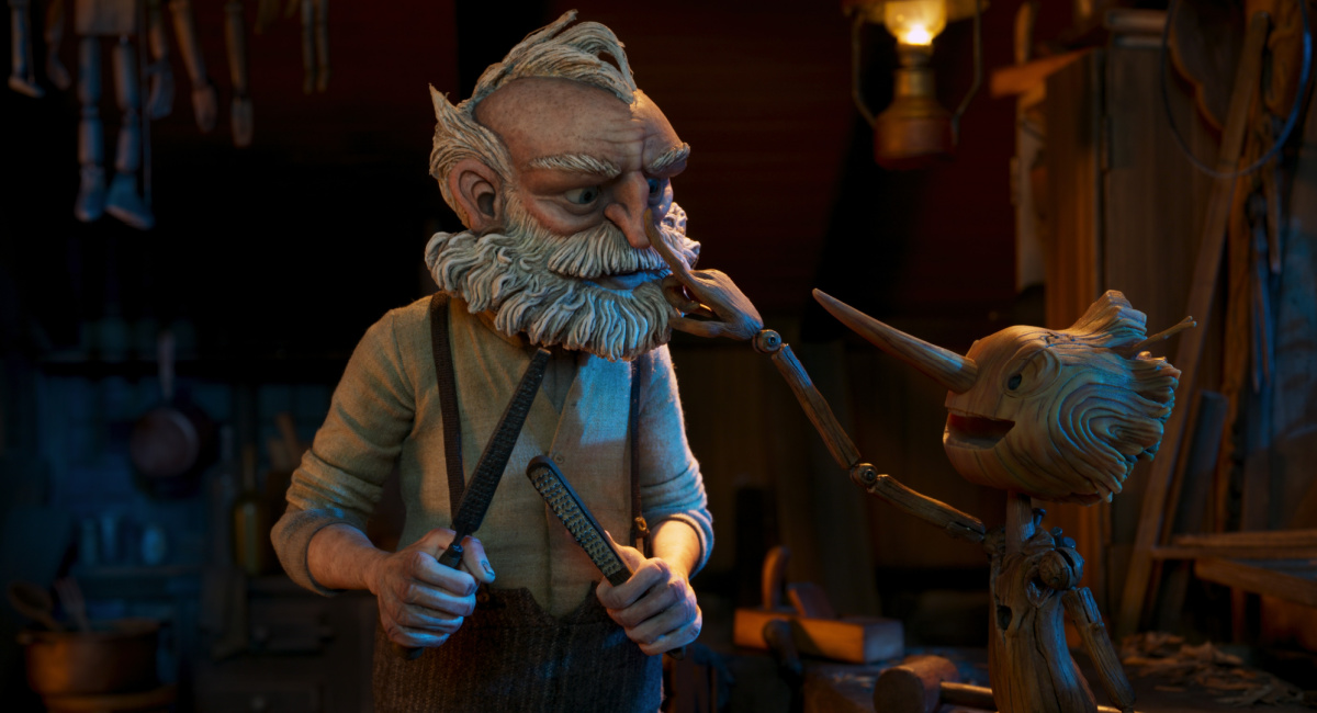 Gepetto (voix de David Bradley) et Pinocchio (voix de Gregory Mann) dans 
