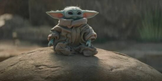 La série "Yoda" dévoile une image inquiétante avant sa sortie - Inside the Magic 3 Grogu assis sur un rocher