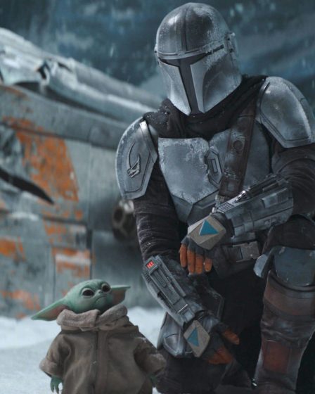 Voyez le Mandalorien tenant une arme iconique de Star Wars - 103