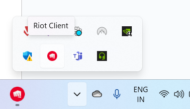Comment réparer VALORANT problèmes de connexion 3 Barre d'état des applications Windows affichant les applications en cours d'exécution, y compris Riot Client